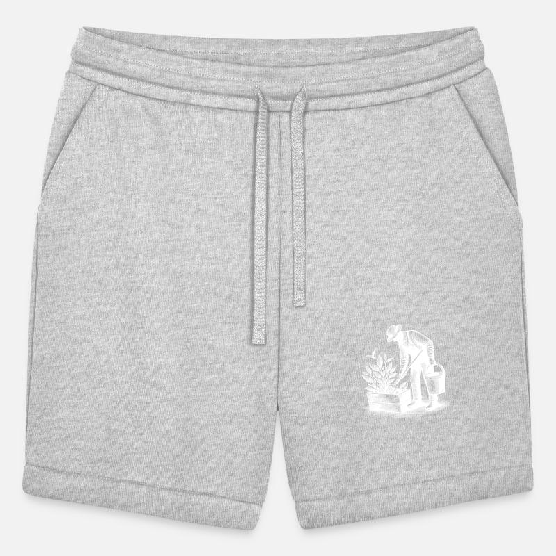 Gardener Gardening In A Raised Bed